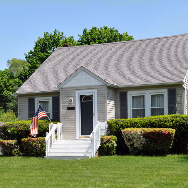 Tan House With Scalloped Siding Sq